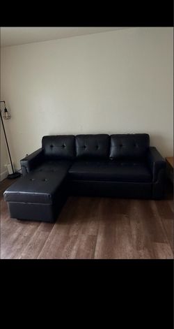 3-seat black leather couch practically new!