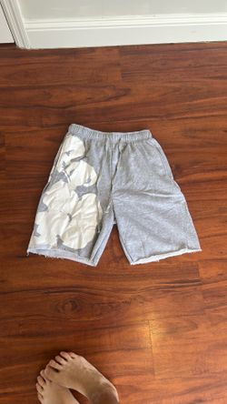 Grey shorts with floral whit print size M
