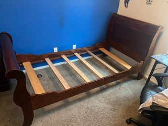 Twin sized wooden bed frame