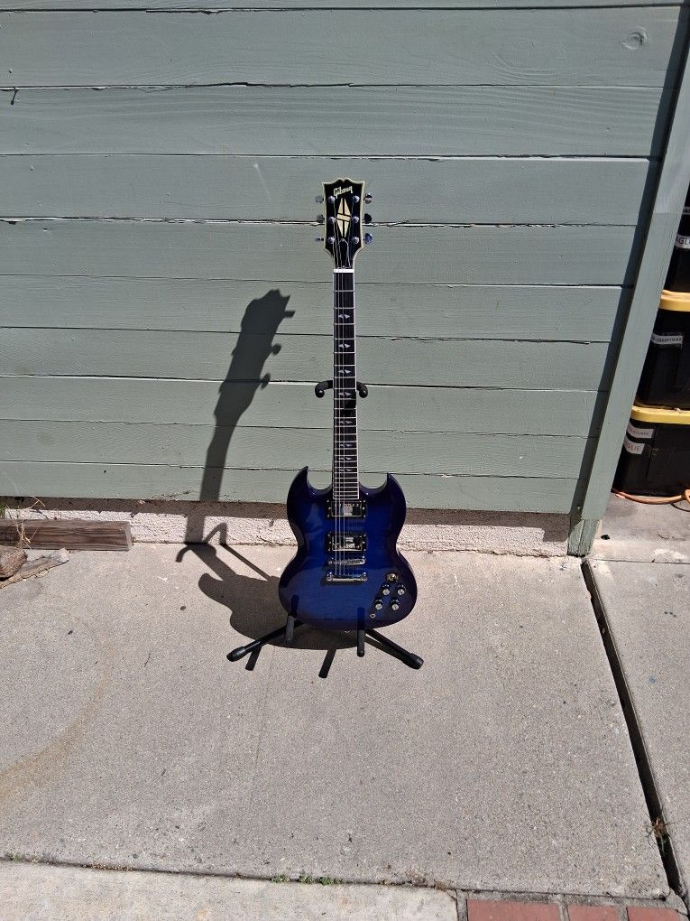 SG Electric Guitar Has a Repaired Neck Plays Or Good For Parts