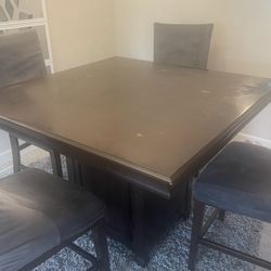 Table and 4 chairs 