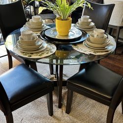 1 Table, 4 Chairs $400