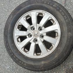 16 inch complete wheel tire barely used for Honda in Everett