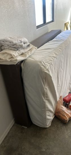 Twin mattress, tv and art