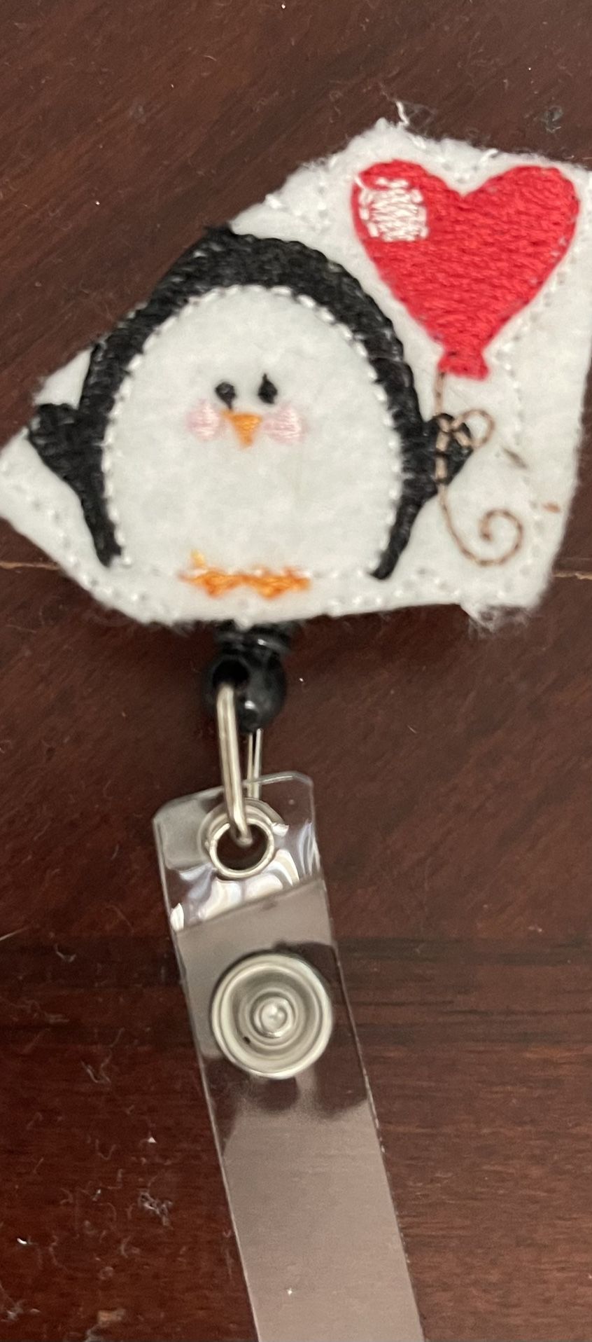 Penguin Badge Reel