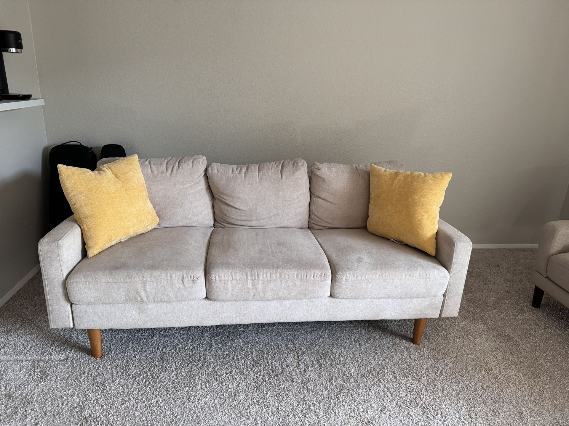 Three Seater Sofa with Yellow Pillows 