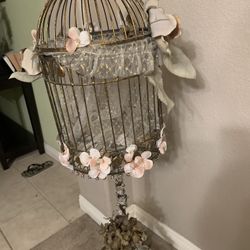 Stunning gold tree with added embellishments and dropping crystals.    Bird cage (gold) rimmed in crystal and flowers (romantic).  Mini bird cage to c