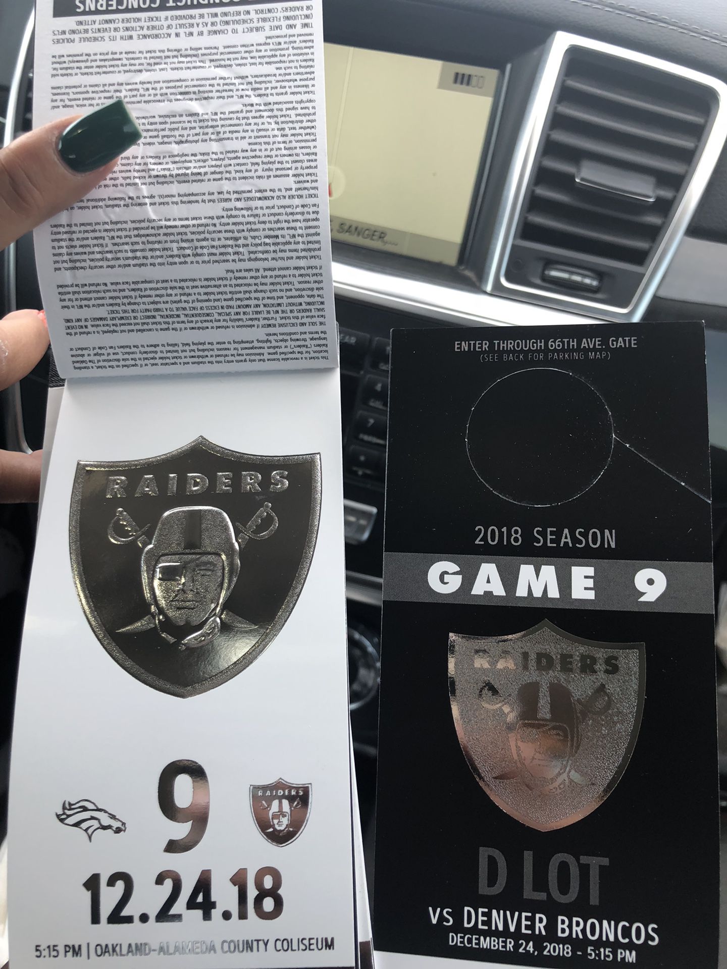2 tickets and parking Raiders and Broncos