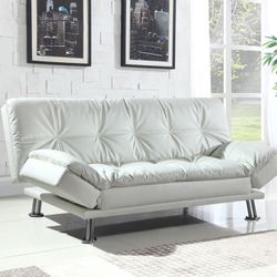 Beautiful Futon, additional add ons available, storage ottoman and chaise