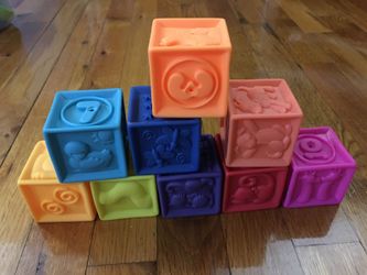 Rubber squeezable stacking blocks