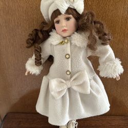 DanDee Collectors Choice Porcelain Doll W/ Brown Curly Hair And  Winter White  Coat And Hat