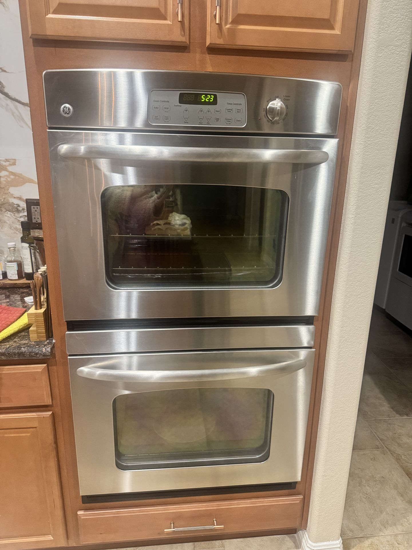 Working GE Double Electri Ovens 28½″ X 51 13/16 X 23 ½″ model JT P35S P1SS Lower Oven Was Almost Never Used. Light In Upper Oven Is Not Working