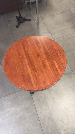 Round Wood Dining Table with Pedestal Base