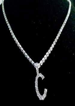 Very Beautiful Blinged Iced out diamond initial charm and chain.