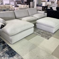 Brand New Cloud Sectional With Feather Filled Cushions. 