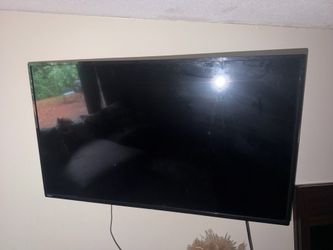 65” Philips Smart TV – Works Great – Wall Mounted