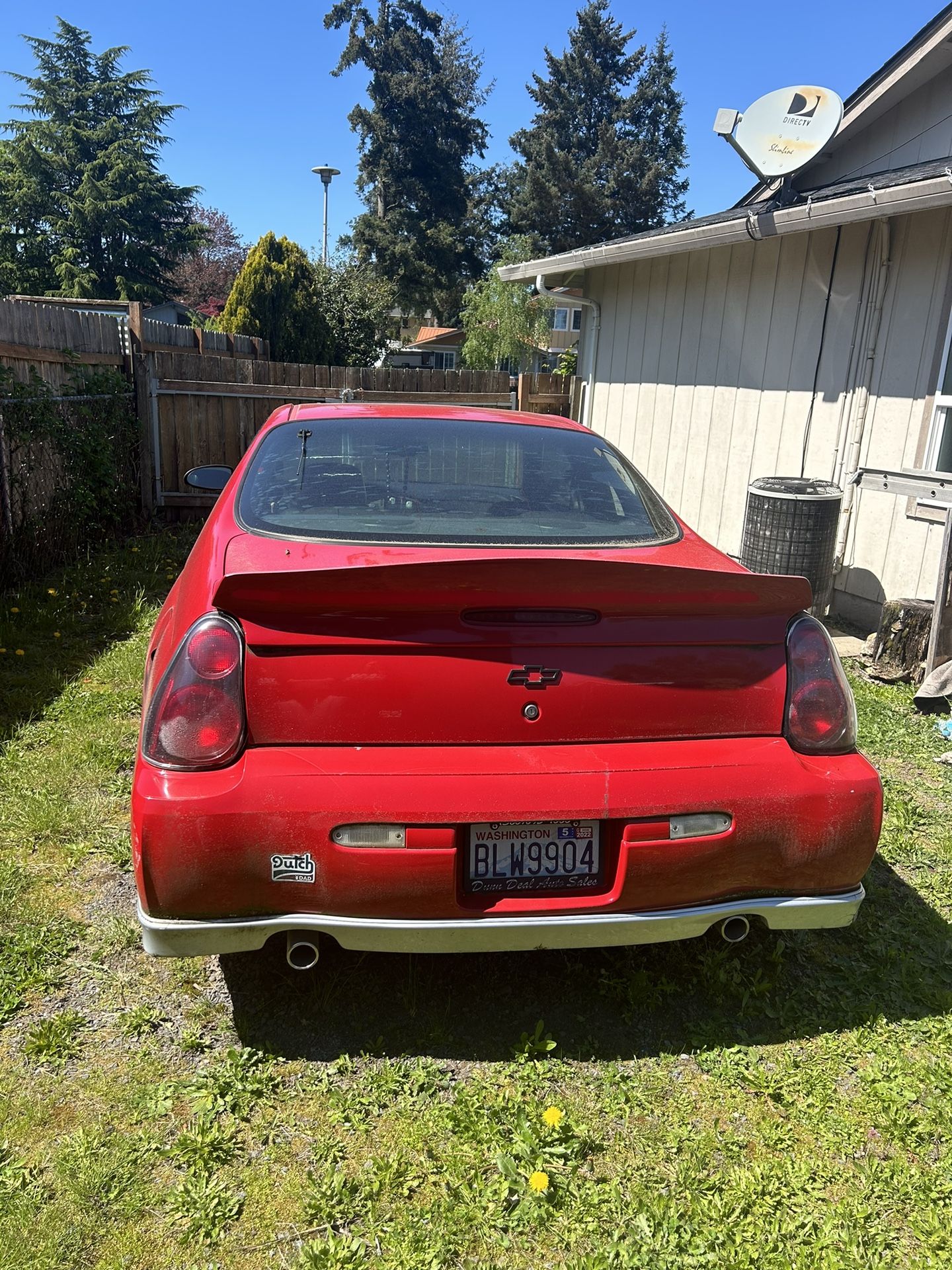 Red 2004 Chevy Monte Carlos