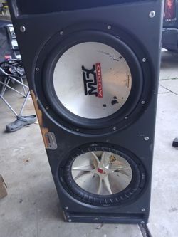 2 12s in a ported box one subwoofer is Kicker and subwoofer
