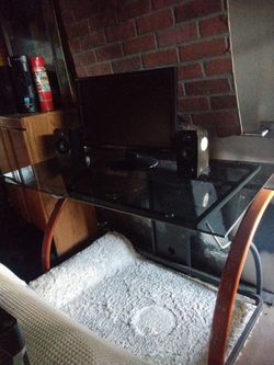Desk with Computer Monitor and Speakers