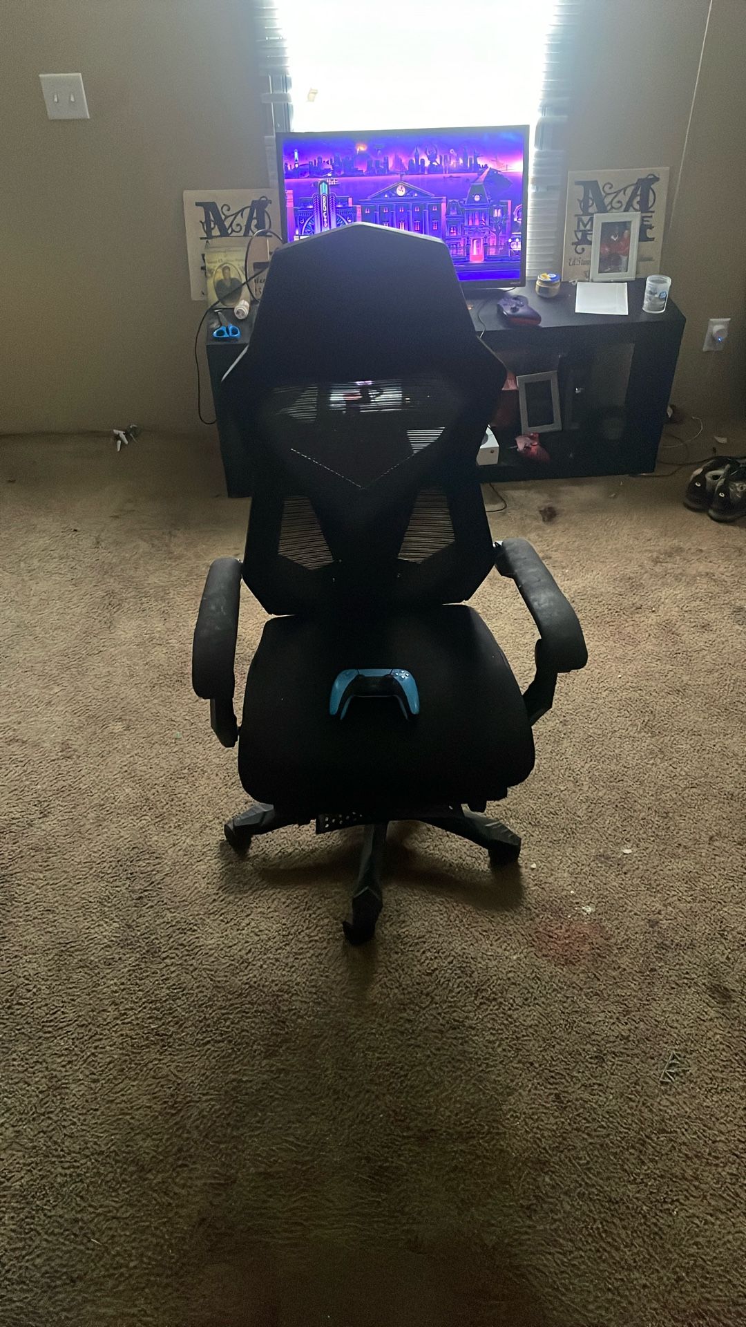 Gaming Chair And Baby Blue Ps5 Contro