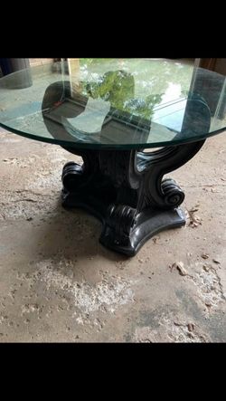 Glass statement table