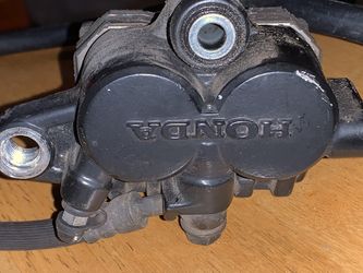 84 CB700SC Right brake caliper front