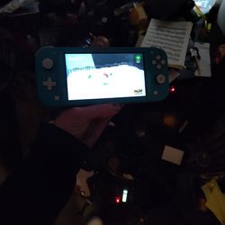 Nintendo Switch Lite W/ Mario Odyssey 