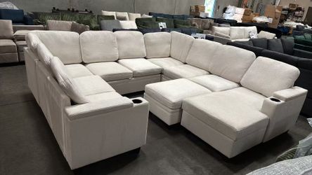 White couch set with pull-out bed and storage