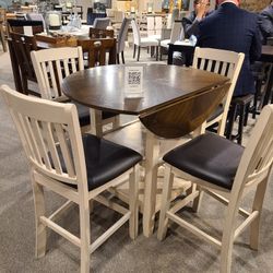 Counter high table and 4 chairs