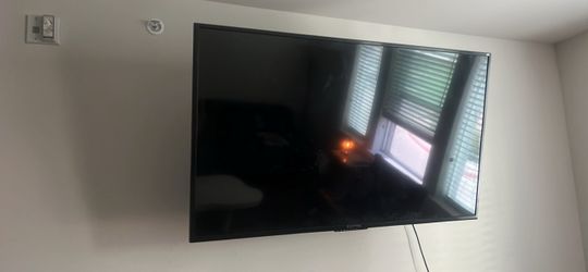 65 inch flat screen tv with tv mount and fire tv stick