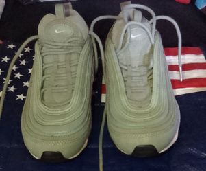 Women light green Nike tennis shoes