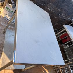 Stainless steel tables