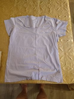 Tshirt Lilac runs smaller than XL