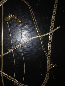 4 necklaces i braclet..975 silver..one 14k Italy necklace...