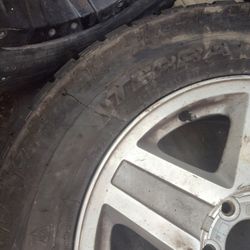 Chevy trailblazer rim $50 Or Trade