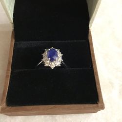 Natural sapphire and diamonds ring