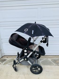 EUC Black & Grey Bugaboo Chameleon stroller with accessories