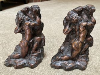 Two 1915 antique bronze coated male figure bookends