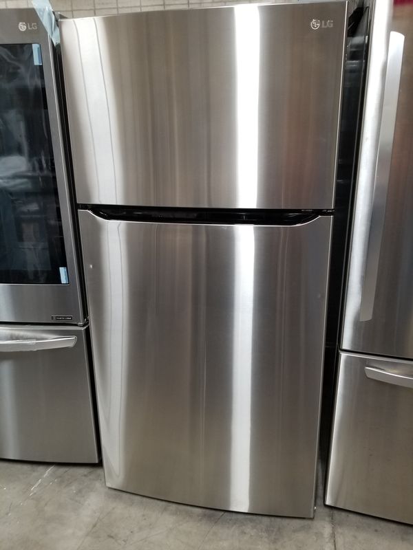 LG Electronics 23.8 cu. ft. Top Freezer Refrigerator with Reversible