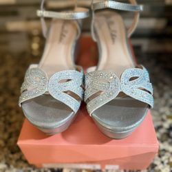 Women’s silver Rhinestone wedges
