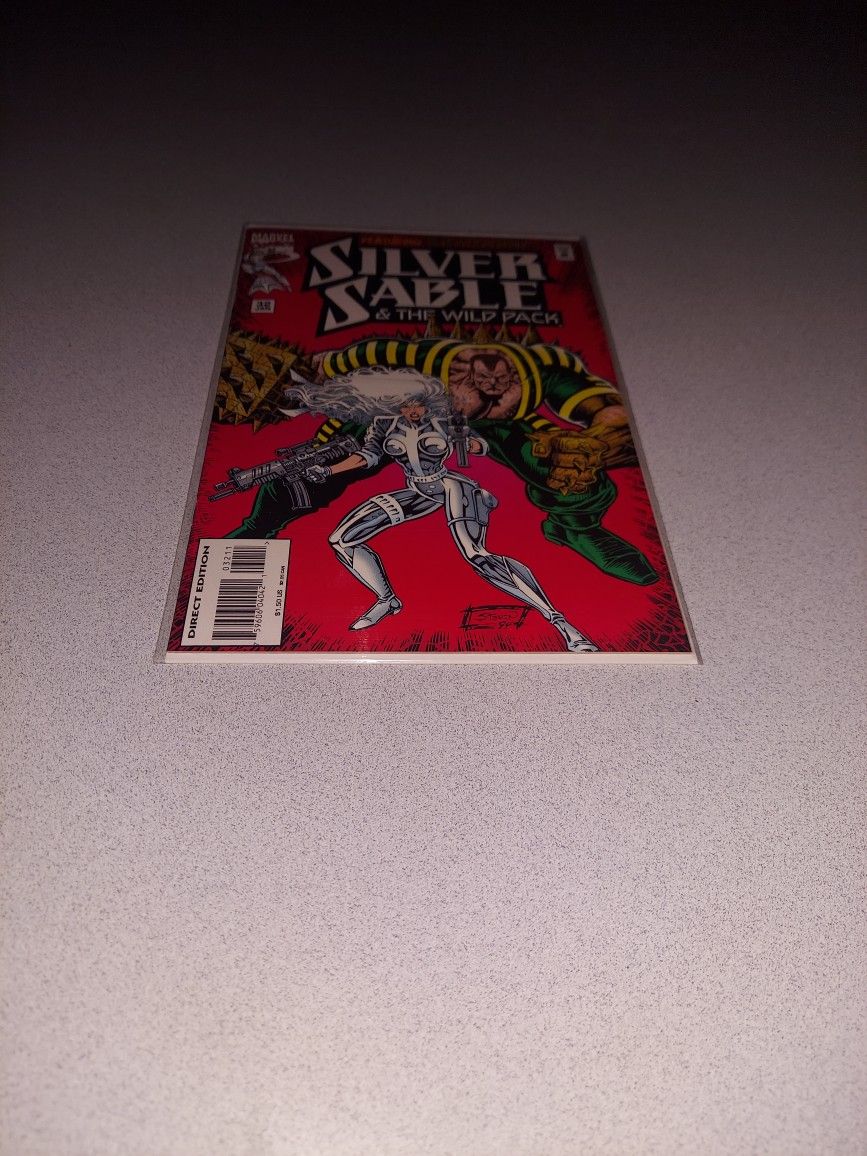 1995 SILVER SABLE & THE WILD PACK #32 COMIC BAGGED AND BOARDED