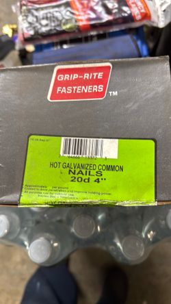 Close box of hot galvanized, common nails, 4 inches