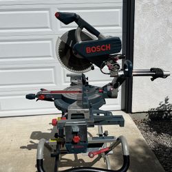 Bosch 5312 - 12” Dual Bevel Slide Miter Saw And A Bosch T4B Gravity Rise