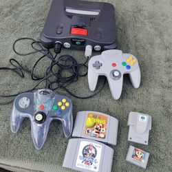 2 Memory Controls. 1 Red Expansion Memory. Nintendo N64 N 64 Console. All cables & 2 Controller. $230! Firm. $30! Per Game or 4 For $100!? All $500! F
