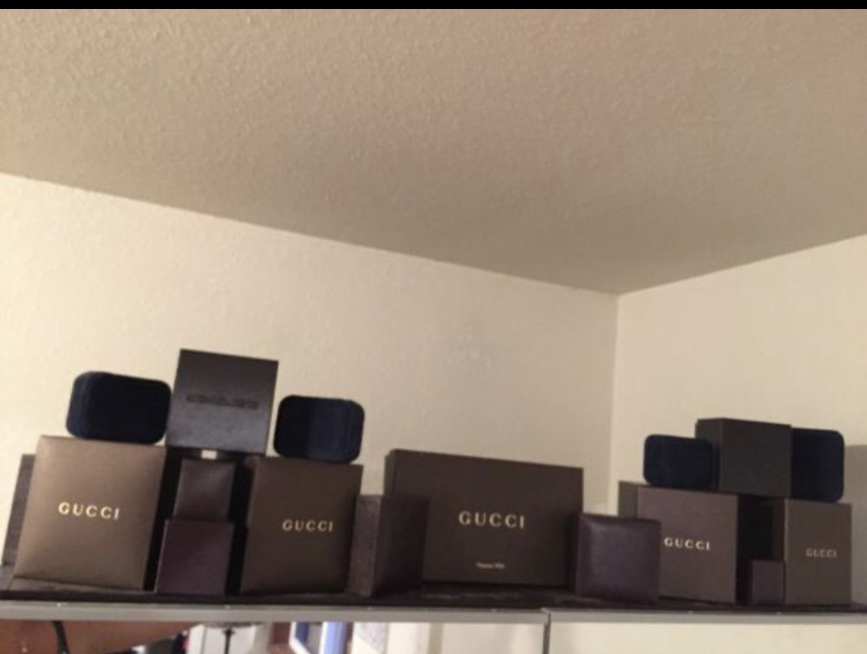 Empty Gucci boxes, Michael kors, high end jewelry boxes etc