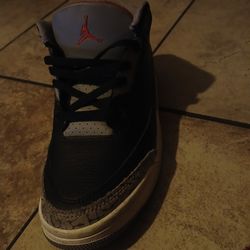 iconic Nike Air Jordan 3 Retro in the classic "Black Cement"