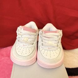 pink nikes (baby)