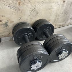 pair of 45lb adjustable dumbbells with plates. 90lb in total  $90