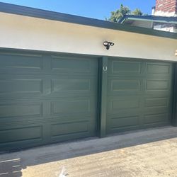 Two Used 9x7 Garage Doors 
