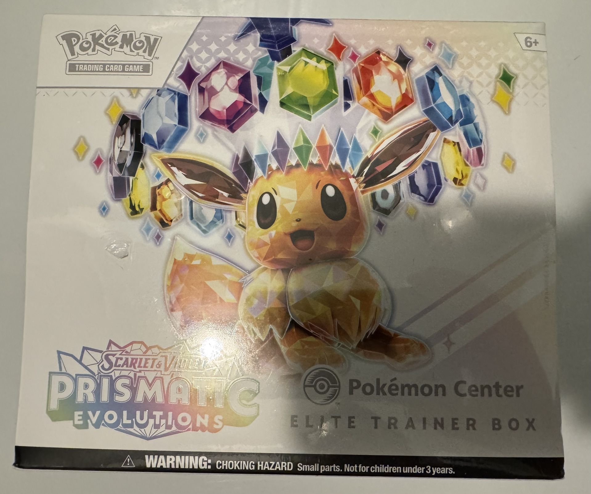 Pokemon TCG Prismatic Evolutions Pokemon Center ETB - Small Tear